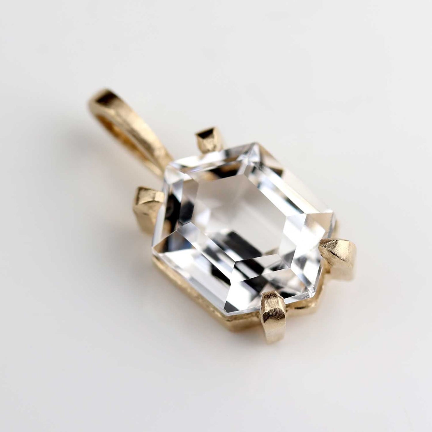 . Prong-set 14k Yellow Gold and 9x7mm Arkansas Hexagon Quartz Matte