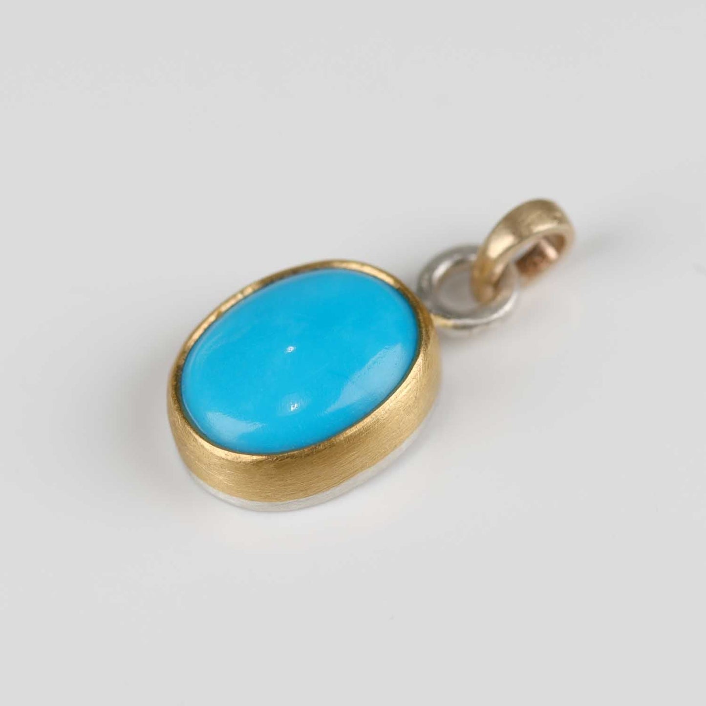Bezel-set Arizona Turquoise Set in Gold & Silver